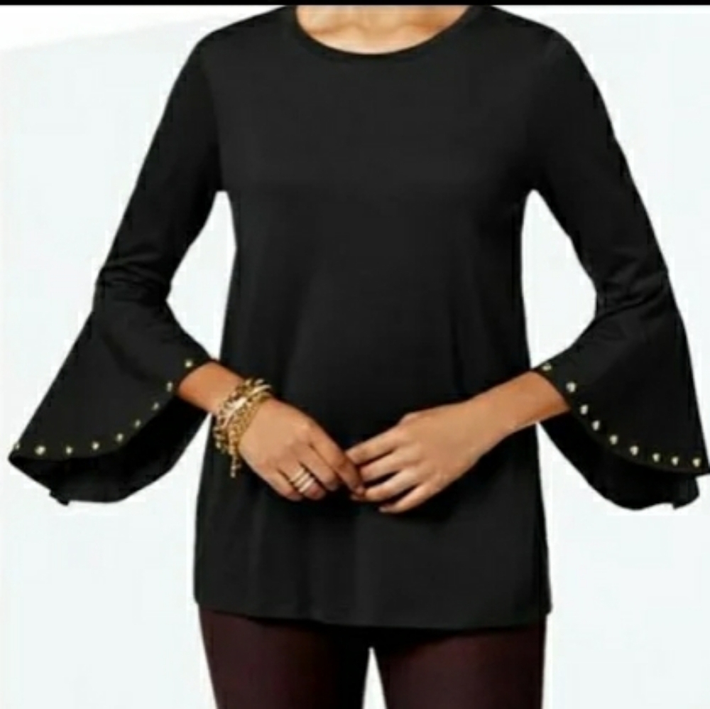 MICHAEL Michael Kors black shirt with long bell sleeve accented with gold studs.